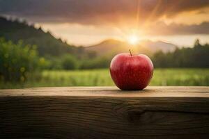 an apple sits on a wooden table in front of a field. AI-Generated photo