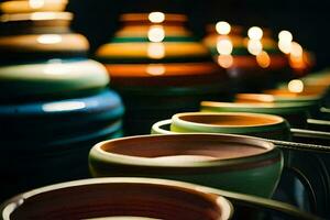 a row of colorful pots and bowls lined up. AI-Generated photo