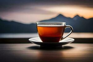 a cup of tea sits on a table in front of a mountain. AI-Generated photo