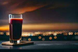 un vaso de rojo jugo en un mesa en frente de un ciudad horizonte. generado por ai foto