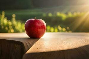 un manzana se sienta en un mesa en frente de un campo. generado por ai foto