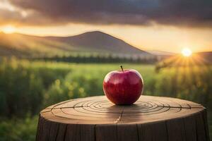 un manzana se sienta en parte superior de un tocón en frente de un puesta de sol. generado por ai foto