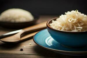 a bowl of rice with a spoon on a wooden table. AI-Generated photo