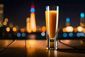 a glass of orange juice sitting on a table in front of a city skyline. AI-Generated photo