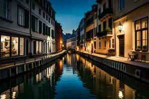 a canal in a city at night with buildings and lights. AI-Generated photo