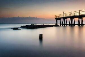 largo exposición fotografía de un muelle a puesta de sol. generado por ai foto