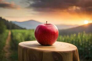 un manzana se sienta en parte superior de un tocón en frente de un puesta de sol. generado por ai foto