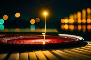 un vela es iluminado en un plato en frente de un ciudad. generado por ai foto