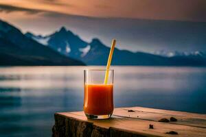 un vaso de naranja jugo en un de madera mesa con montañas en el antecedentes. generado por ai foto