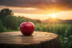 an apple sits on top of a stump in front of a sunset. AI-Generated photo