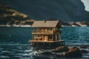 a miniature house on a small island in the ocean. AI-Generated photo