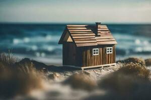 a miniature house on the beach with the ocean in the background. AI-Generated photo