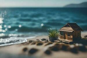 un miniatura casa en el playa con el Oceano en el antecedentes. generado por ai foto