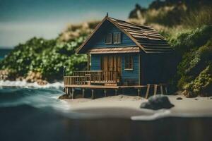 a miniature house on the beach by the ocean. AI-Generated photo