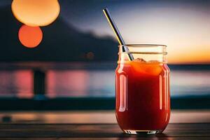 a glass of red juice on a table in front of the ocean. AI-Generated photo