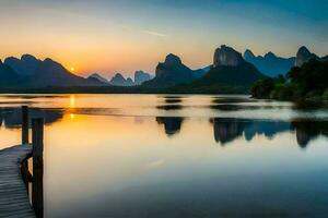 the sun rises over the mountains in li river, china. AI-Generated photo