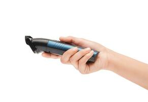 Woman Hand Holding An Electric Hair Clipper, Trimmer Or Shaver Closeup Photo On White Background