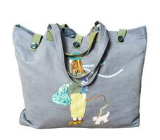 closed handmade gray canvas tote bag with applique photo