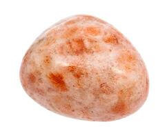 tumbled Sunstone heliolite gem stone isolated photo