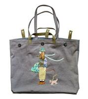 gray fabric tote bag with girl and dog appliqued photo