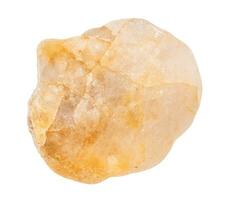 yellow Calcite pebble isolated on white photo