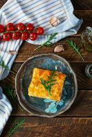 Meat lasagna with bolognese sauce and bechamel sauce. Classic lasagna. Top view photo