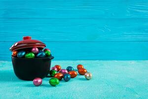 Colorful background of Easter chocolate eggs. Delicious chocolate eggs photo