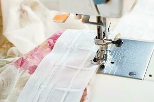 Modern sewing machine, sewing process photo