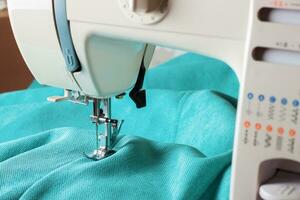 sewing machine and turquoise fabric photo