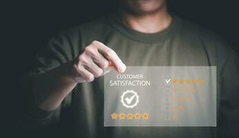 Satisfaction survey concept and customer service, using digital media technology, questionnaire, and rating satisfaction, rating satisfaction five stars, searching for information, online marketing photo