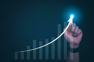 Businessman showing a chart and continuous growth of the business, investment funds in the stock market, and digital assets, analyzing stock chart financial data. and forex trading, digital marketing photo