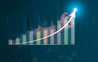 Businessman showing a chart and continuous growth of the business, investment funds in the stock market, and digital assets, analyzing stock chart financial data. and forex trading, digital marketing photo