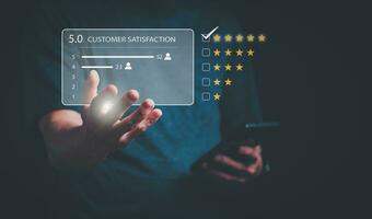 Satisfaction survey concept and customer service, using digital media technology, questionnaire, and rating satisfaction, rating satisfaction five stars, searching for information, online marketing photo