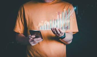 Planning and strategy, stock market, business growth, progress or success concept, businessman or trader showing growing virtual holographic stocks, invest in stock market trading or digital assets photo
