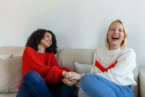 female couple love moments happiness concept, Two friends cuddling and showing affection photo