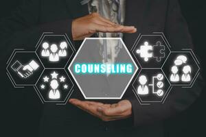 Counseling concept, Business woman hand holding counseling icon on virtual screen. photo