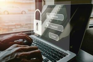 Man hand typing on keyboard with login and password on screen display, cyber security concept, data protection and secured internet access. photo