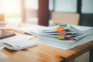 Stack overload document report paper with colorful paperclip place on office desk, paperless business concept. photo