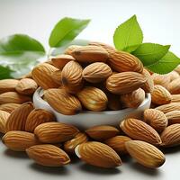 Sweet brown almonds on a white background photo