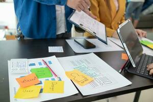 team of UI UX web designer are working together to develop mobile responsive websites with UI UX front end designer previews, UI UX web development ideas, front end designer. application development photo
