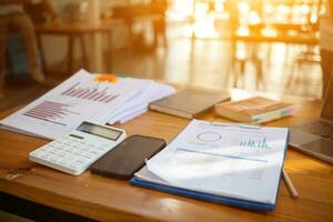 stack of documents on secretary desk were prepared It is legal document for real estate buyers to be used as evidence of possession. stacked papers were placed on the table awaiting examination. photo