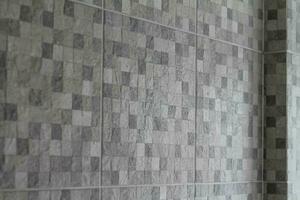 Marble tile backgrounds with beautiful natural patterns are used for flooring and interior swimming pools because they are easy to clean. Marble tile background  and Copy Space for inserting text. photo