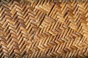 room divider background is made from woven bamboo, a natural material that creates beautiful background. woven bamboo wall background has traces and is suitable for design backgrounds. photo