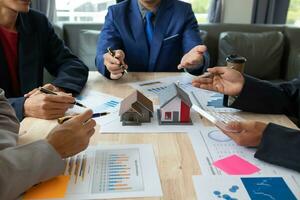 Businessmen and investors attend the meeting discuss give advice and consult with each other about businesses they have invested in together. consultation and advice between businessmen and investors. photo