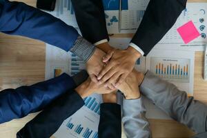 Businessmen and investors shake hands after attending  meeting with advisory team after receiving advice from  advisory team about jointly invested business. Businessmen Team handshake concept photo