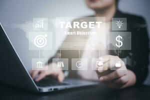 Targeting with marketing business concept, Business people using pen touch graph target smart Objectives, Executive marketing, investment goal and target for business investment, business new idea photo
