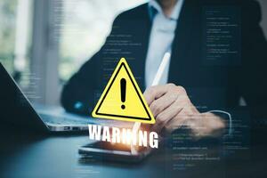 notification error 404 and maintenance with triangle caution warning sign for notification error, Programmer using laptop with triangle caution warning sign, hacker attacks cyber crime, cyber security photo