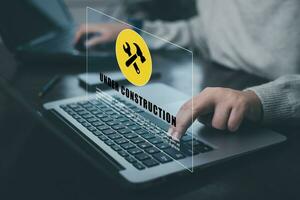 notification error under and triangle caution warning sign for notification error, Programmer using laptop with triangle caution warning sign, hacker attacks cyber crime, cyber security photo
