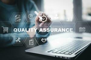 Quality assurance of business services, Smartphone shows the sign of service and ISO certification, the Quality certificate is compliant, and the Check mark symbol represents standard quality control. photo