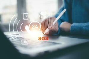 SOS with Emergency app concept, Business people using a laptop and touch bar Emergency app at home, call phone, Chat message icon, Emergency application from smartphone for elderly, call for help photo